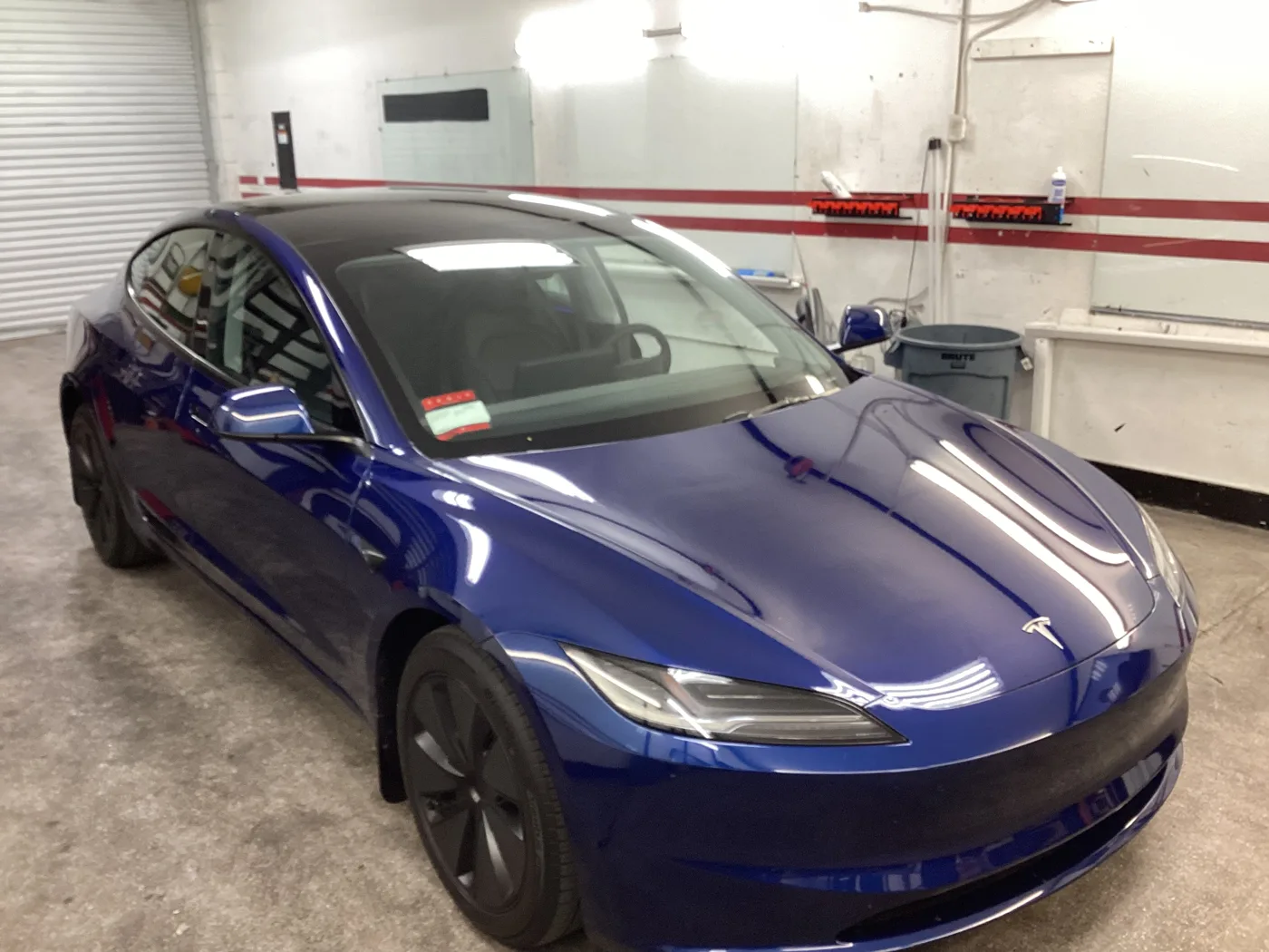 Blue Tesla sedan at Superior — window tint photo collection
